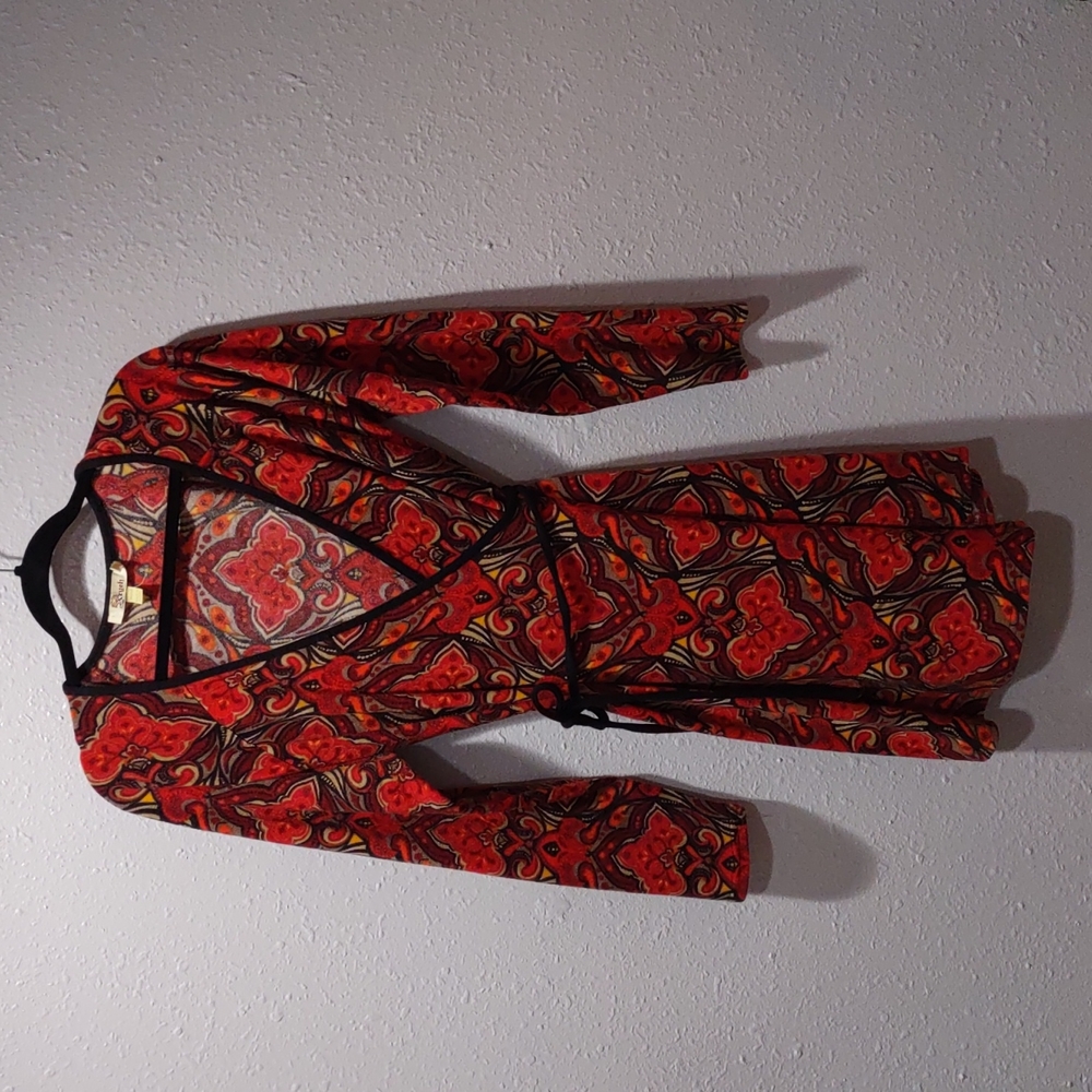 Aryeh wrap dress, Sz L, 90% acrylic, 10% nylon. Soft wool-like look and feel.
